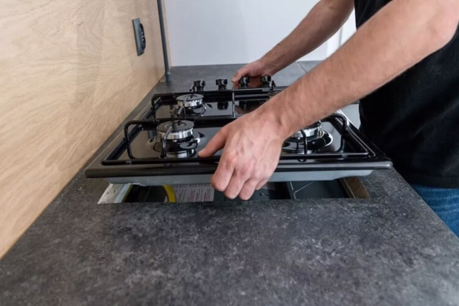 technician installting cooker